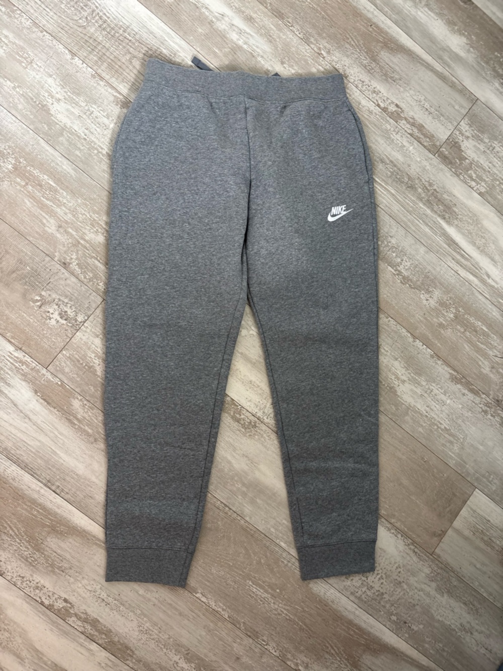 Nike Kids Gray Sweatpants with White Logo and drawstring